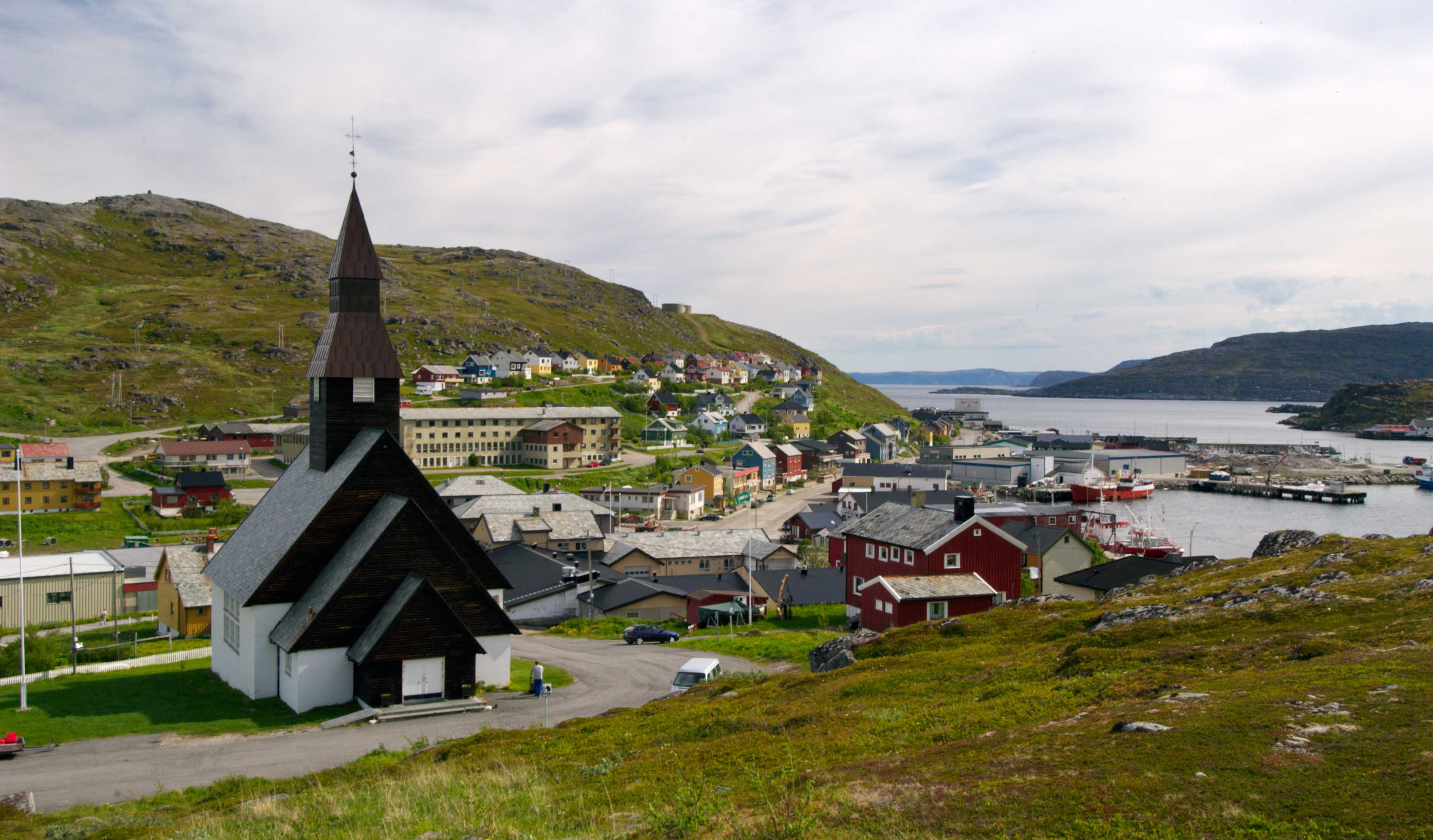 Church and houses in the small town of Havøysund in Måsøy, Finnmark.