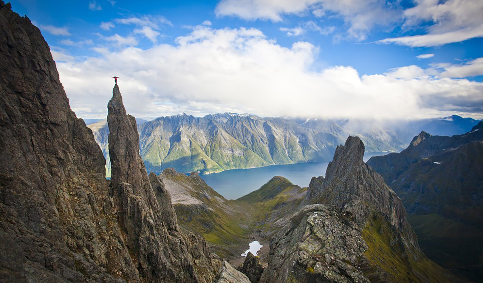 Climber on the cliff Bladet I Molladalen, Hjørundfjorden, Sunnmøre.