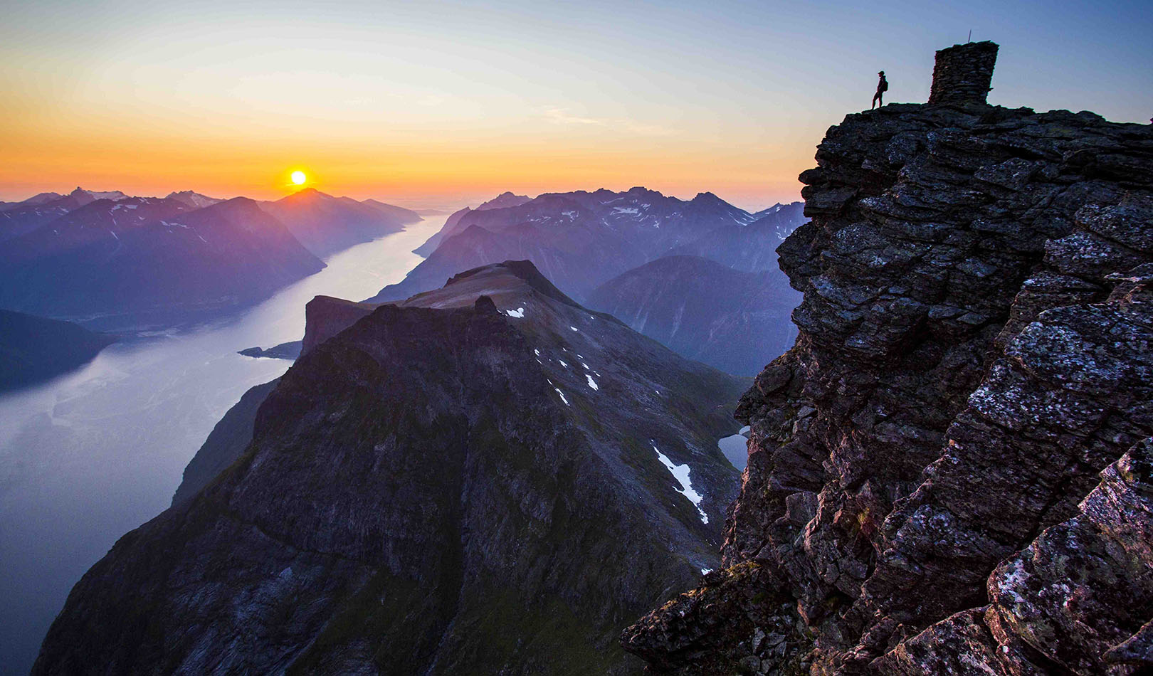 The Sunnmøre Alps tower over the Hjørund fjord.