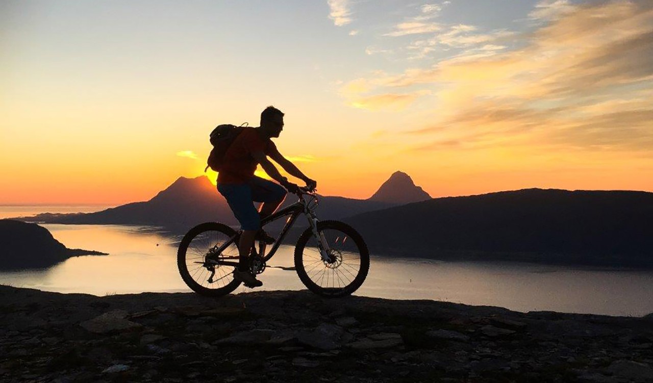 Biking when the midnight sun is shining - here at Nesna.